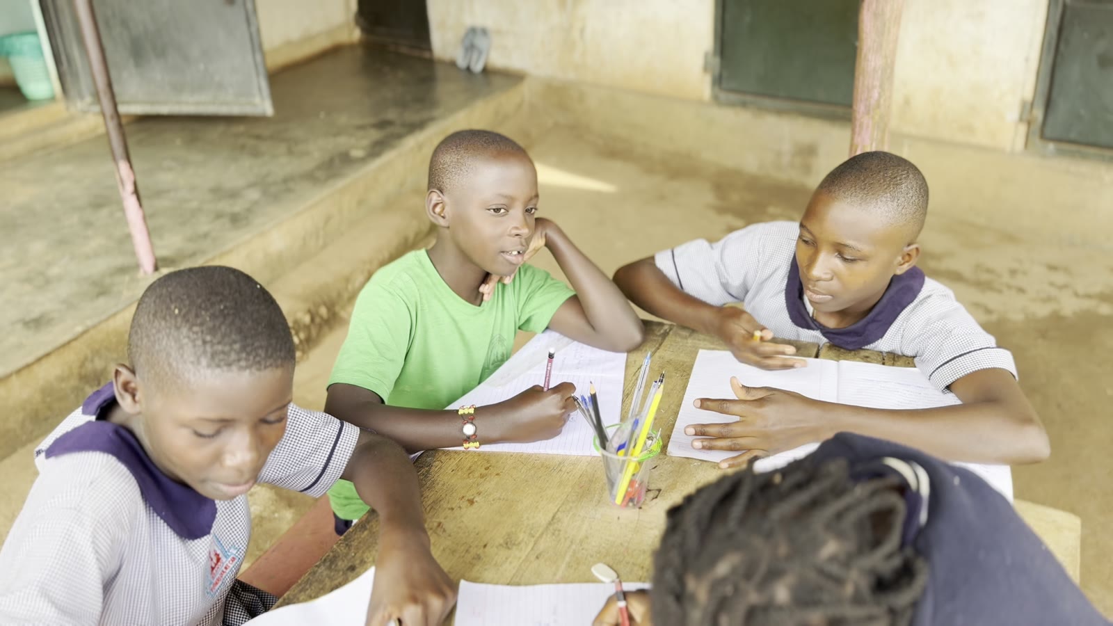 A writing lesson at the table
